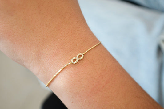 Pulseira regulável com infinito de zircônias banhada a ouro 18k - Biju & Cia.