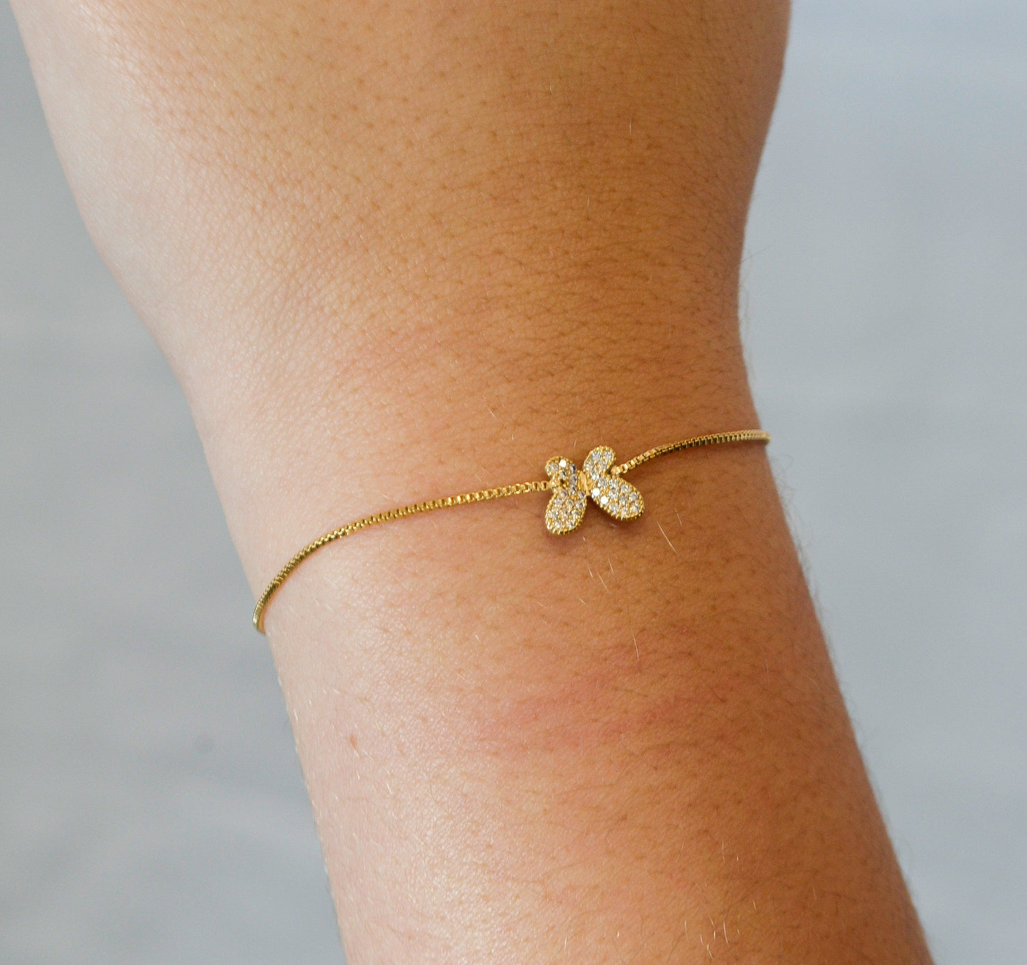 Pulseira regulável borboleta com zircônias banhada a ouro 18k - Biju & Cia.