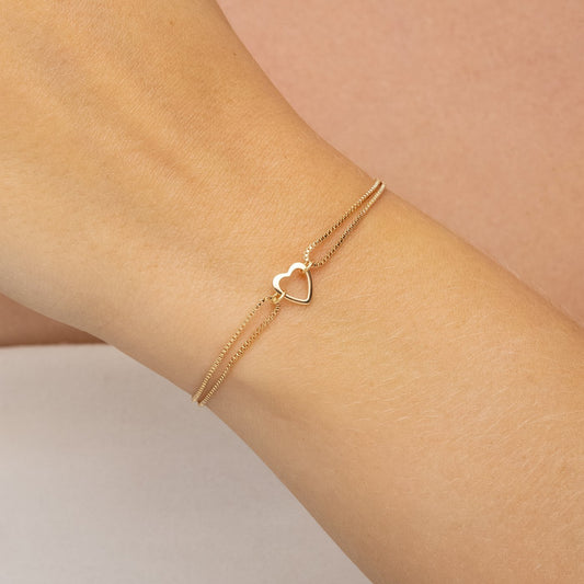 Pulseira infantil com coração banhada a ouro 18k