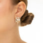 Brinco com zircônias banhado a ouro 18k
