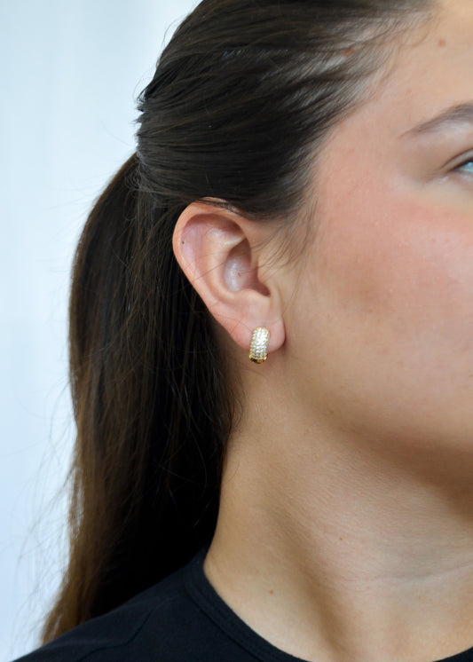 Argola articulada com zircônias banhada a ouro 18k